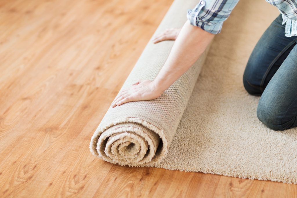 Rubber tiles over online carpet